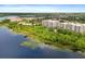 Condo community nestled on the lakefront with lush landscaping at 6312 Buford St # 303, Orlando, FL 32835