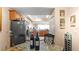 Casual dining area with kitchen view, granite-top table and chairs at 6312 Buford St # 303, Orlando, FL 32835