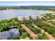 Aerial view of community near lake at 6312 Buford St # 303, Orlando, FL 32835