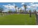 Community dog park with artificial turf and gated area at 7521 Laureate Blvd # 5304, Orlando, FL 32827