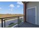 Private balcony offering a view of open landscape and distant cityscape at 7521 Laureate Blvd # 5304, Orlando, FL 32827