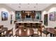 Community kitchen with an island, seating, and modern appliances at 7521 Laureate Blvd # 5304, Orlando, FL 32827
