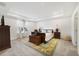 Spacious Primary bedroom with carpeted floors and large windows at 875 Fillmore Ct, Davenport, FL 33837