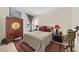 Guest bedroom with double bed and neutral color scheme at 875 Fillmore Ct, Davenport, FL 33837