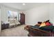 Versatile office or den with built-in shelving and daybed at 875 Fillmore Ct, Davenport, FL 33837