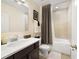 Small bathroom with single vanity, shower/tub combo at 875 Fillmore Ct, Davenport, FL 33837