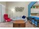Living area with comfy seating and a wooden coffee table at 3587 Casalta Cir, New Smyrna Beach, FL 32168