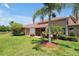 Relaxing backyard with patio furniture and water view at 3587 Casalta Cir, New Smyrna Beach, FL 32168