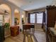Home office with hardwood floors, a desk, and built in shelving at 251 Silver Maple Rd, Groveland, FL 34736