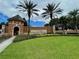 Trilogy community entrance with lush landscaping at 251 Silver Maple Rd, Groveland, FL 34736
