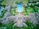 Community clubhouse and pool area from above at 251 Silver Maple Rd, Groveland, FL 34736