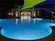 Night view of resort-style pool and clubhouse at 251 Silver Maple Rd, Groveland, FL 34736