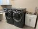 Laundry room with side-by-side washer and dryer, and utility sink at 251 Silver Maple Rd, Groveland, FL 34736