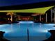 Tranquil night scene at the community pool at 251 Silver Maple Rd, Groveland, FL 34736