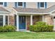 Inviting front entrance with double doors, brick accents, and lush landscaping at 4436 Yachtmans Ct, Orlando, FL 32812