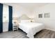 Spacious bedroom with king-size bed and nightstands at 1136 Castle Pines Ct, Reunion, FL 34747