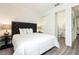 King-size bed, ensuite bathroom, and plenty of space at 1136 Castle Pines Ct, Reunion, FL 34747