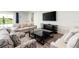 Comfortable living room with a view of the pool at 1136 Castle Pines Ct, Reunion, FL 34747
