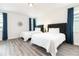 Bedroom with two queen beds and dark-gray headboards at 1136 Castle Pines Ct, Reunion, FL 34747