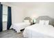 Bedroom with two twin beds at 1136 Castle Pines Ct, Reunion, FL 34747