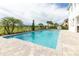 Relaxing pool with patio and golf course view at 1136 Castle Pines Ct, Reunion, FL 34747