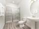 Clean bathroom with a walk-in shower at 1136 Castle Pines Ct, Reunion, FL 34747