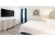 Bedroom with king bed and dresser at 1136 Castle Pines Ct, Reunion, FL 34747
