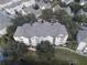 Aerial view of a residential building and surrounding area at 3446 Soho St # 304, Orlando, FL 32835