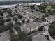 Aerial view of a community with lake and golf course views at 3446 Soho St # 304, Orlando, FL 32835