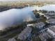 Aerial view of lakefront community with resort-style amenities at 3446 Soho St # 304, Orlando, FL 32835