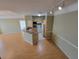Open kitchen with breakfast bar and light wood cabinets at 3446 Soho St # 304, Orlando, FL 32835