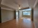 Spacious living room with wood floors and high ceilings at 3446 Soho St # 304, Orlando, FL 32835