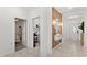 Bright entryway with tile floors and access to laundry and bedroom at 3846 Cabo Rojo Dr, Saint Cloud, FL 34772