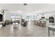 Open concept kitchen and living area with modern finishes at 3846 Cabo Rojo Dr, Saint Cloud, FL 34772