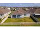 Aerial view of house with backyard, fence, and neighborhood at 3846 Cabo Rojo Dr, Saint Cloud, FL 34772