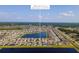 Community view showcasing home near lake at 3846 Cabo Rojo Dr, Saint Cloud, FL 34772