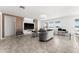Spacious living room with large TV and lake view at 3846 Cabo Rojo Dr, Saint Cloud, FL 34772