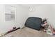 Simple bedroom with window, air mattress, and closet space at 3846 Cabo Rojo Dr, Saint Cloud, FL 34772