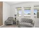 Living room with grey sofas and view of the lake at 3846 Cabo Rojo Dr, Saint Cloud, FL 34772