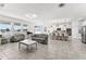 Modern kitchen with island and white cabinetry at 3846 Cabo Rojo Dr, Saint Cloud, FL 34772