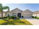 Single story home with two-car garage and landscaping at 3846 Cabo Rojo Dr, Saint Cloud, FL 34772