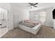 Spacious bedroom with a large bed and ceiling fan at 3846 Cabo Rojo Dr, Saint Cloud, FL 34772