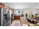Large kitchen island and stainless steel appliances at 2862 Mosshire Cir, St Cloud, FL 34772