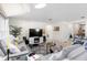 Relaxing living room featuring a fireplace and comfortable seating at 2862 Mosshire Cir, St Cloud, FL 34772