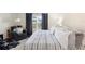 Relaxing bedroom with king-size bed and sitting area at 2862 Mosshire Cir, St Cloud, FL 34772