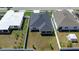 Aerial view of the house and neighboring homes at 2862 Mosshire Cir, St Cloud, FL 34772