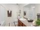 Clean bathroom with granite countertop and bathtub/shower combo at 2862 Mosshire Cir, St Cloud, FL 34772