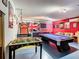 Game room with a pool table, foosball, and arcade game at 114 Castlemain Cir, Davenport, FL 33897