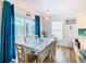 Dining area with sliding doors leading to a patio at 114 Castlemain Cir, Davenport, FL 33897
