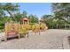 playground with swings, slides, and climbing structures at 5204 Oakbourne Ave, Davenport, FL 33837